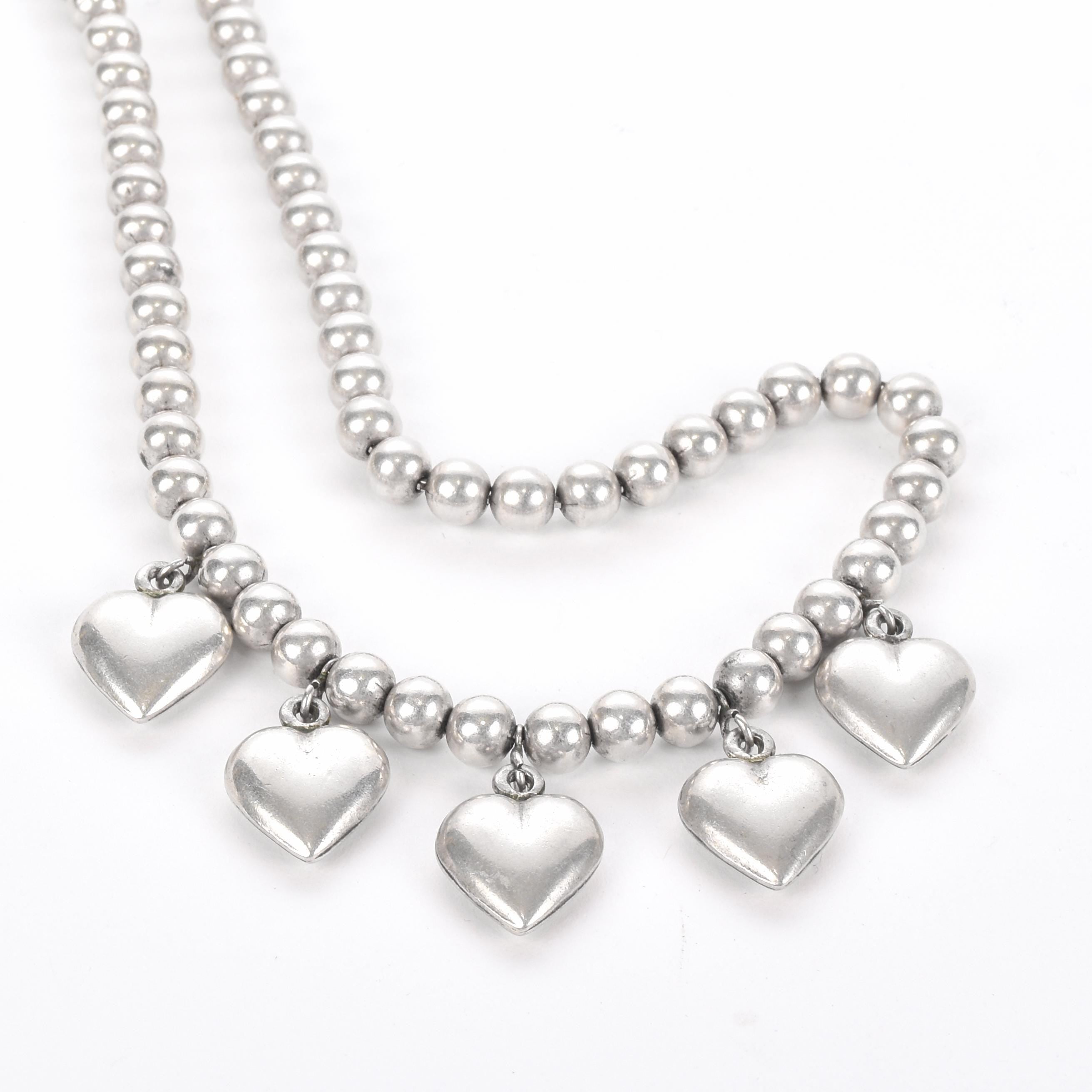 Sterling Silver Beaded Necklace with Heart Pendants
