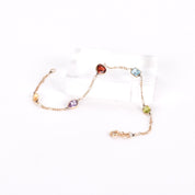 14K Gold Multi-Stone Station Bracelet on Figaro Chain