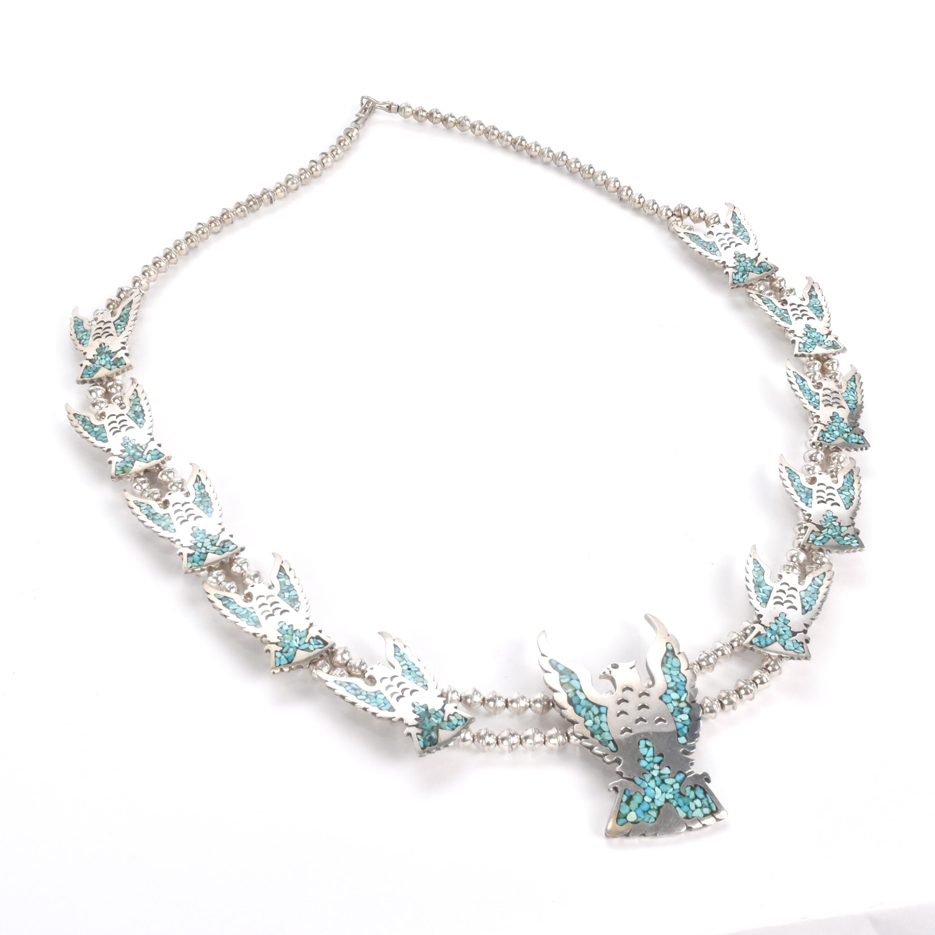 1970s Sterling Silver Falcon Squash Blossom with Turquoise Chip Inlay
