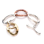 Three-Tone Silver. Brass, and Copper Chunky Link Bracelet