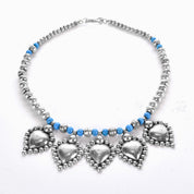 Sterling Silver and Turquoise Beaded Necklace with Large Heart-Shaped Silver Beads