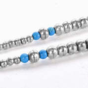 Sterling Silver and Turquoise Beaded Necklace with Large Heart-Shaped Silver Beads