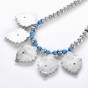 Sterling Silver and Turquoise Beaded Necklace with Large Heart-Shaped Silver Beads