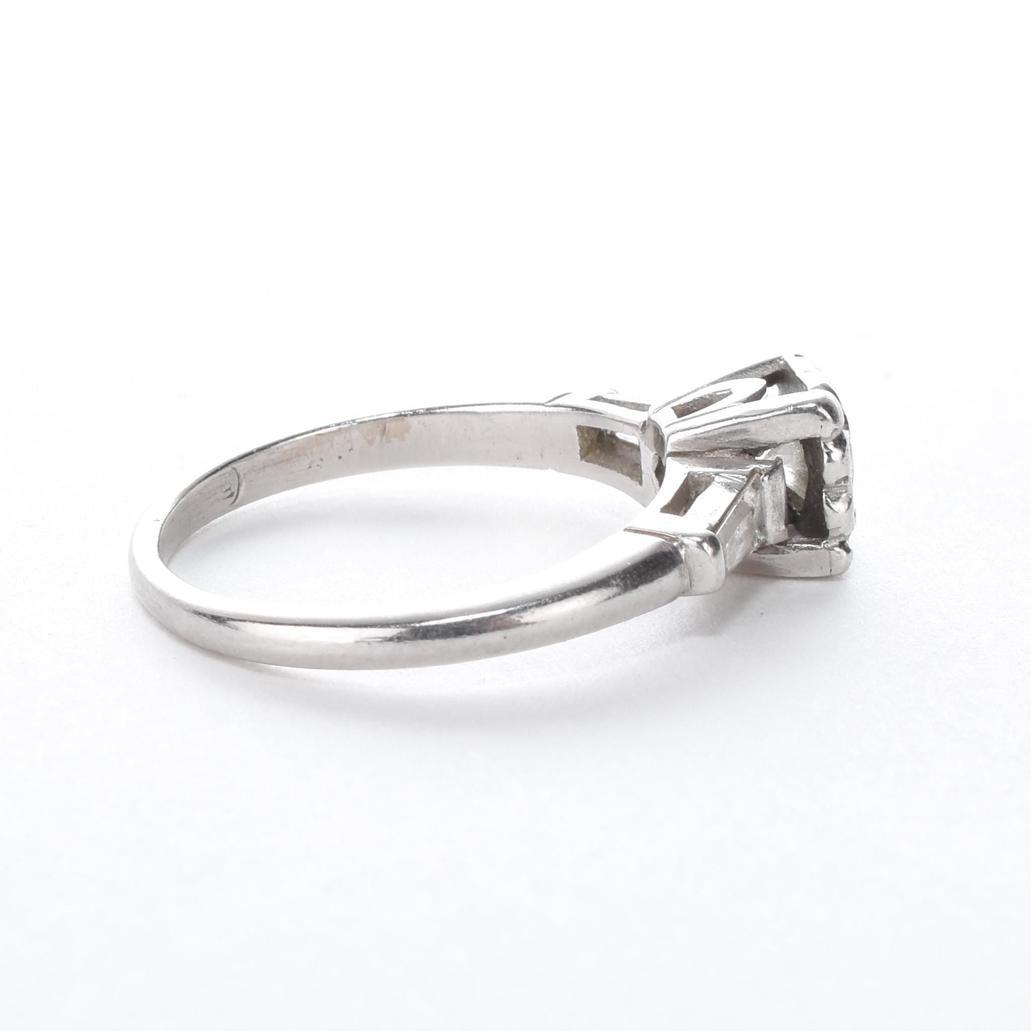 Platinum Brilliant Cut Diamond Two-Baguette Engagement Ring
