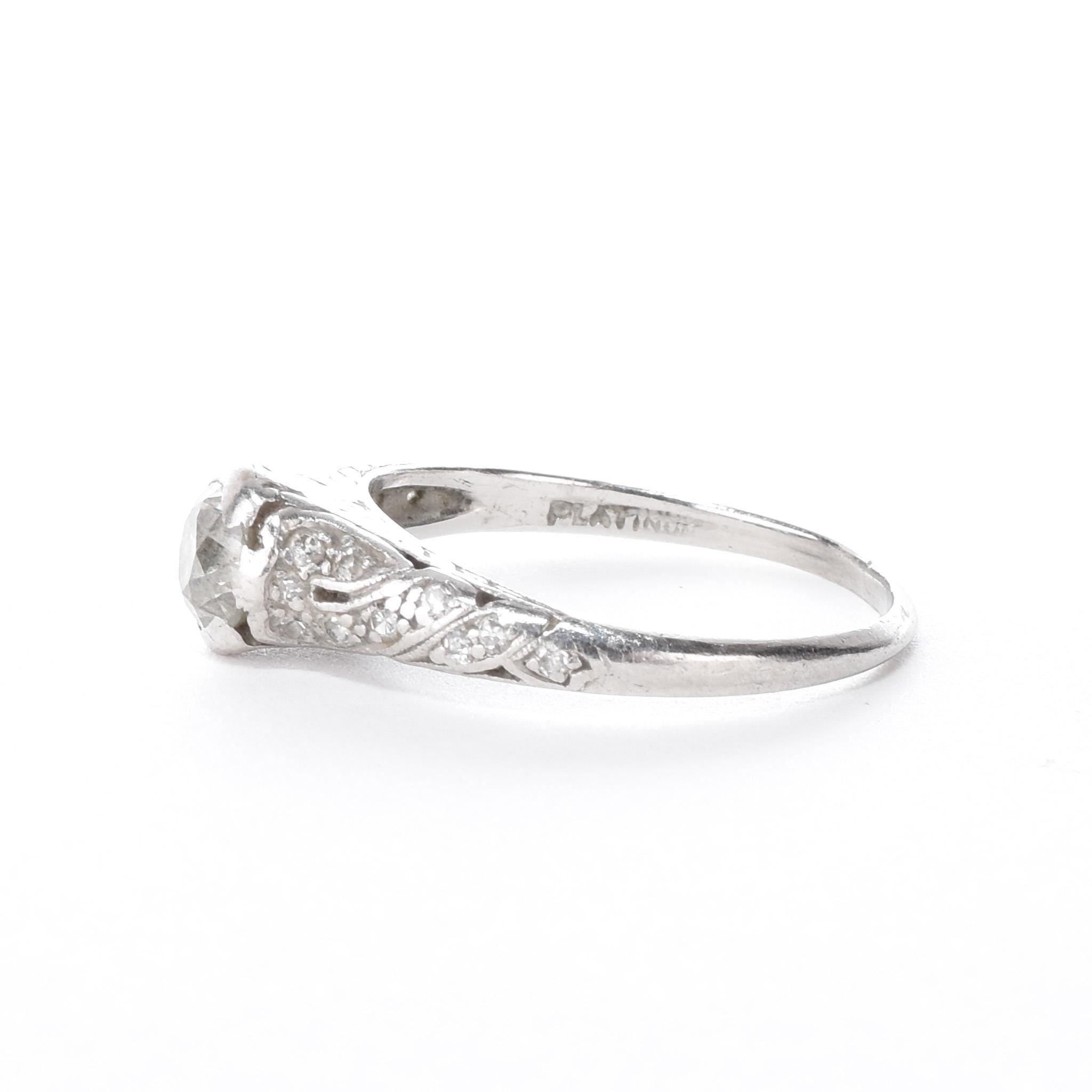 Platinum Natural .70 CT Round Cut Carved Engagement Ring
