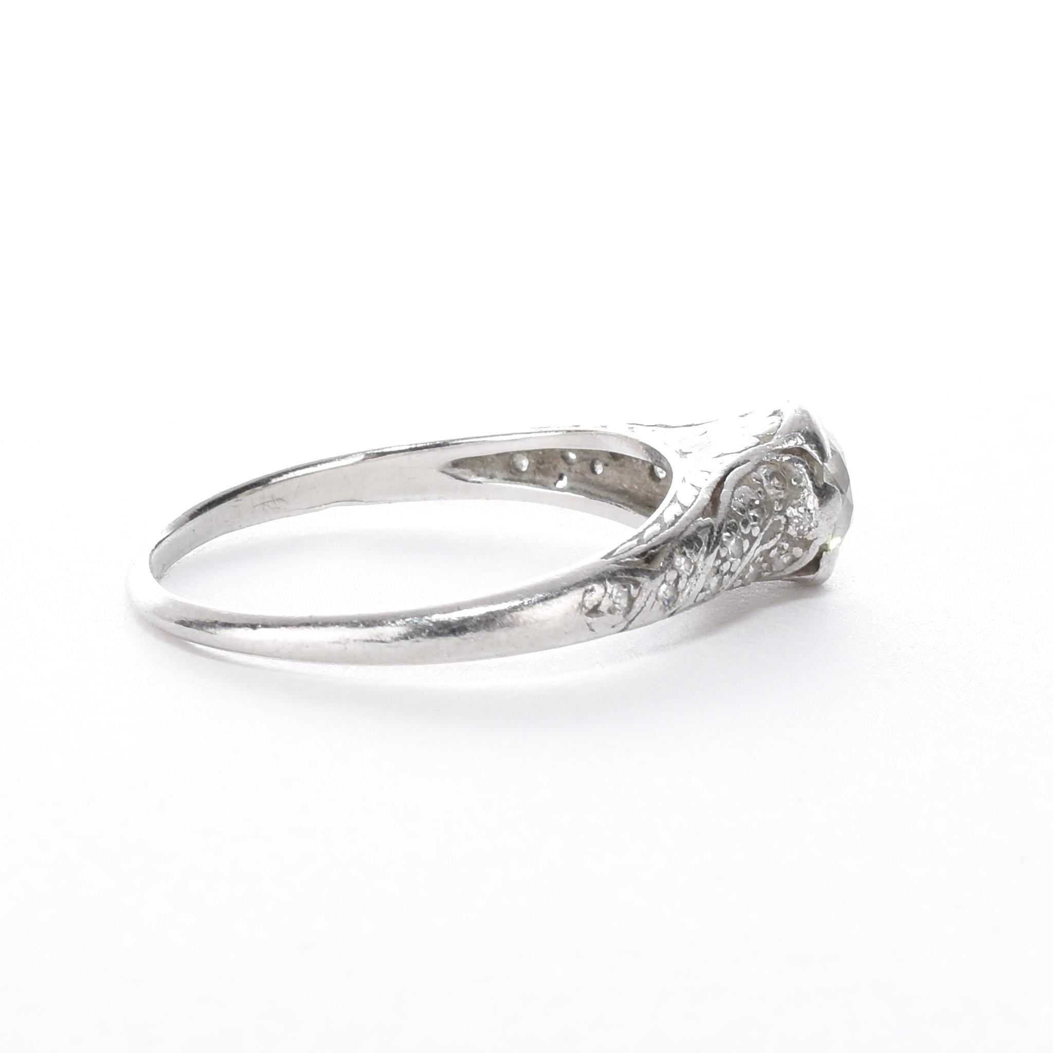 Platinum Natural .70 CT Round Cut Carved Engagement Ring
