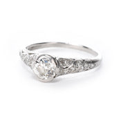 Platinum Natural .70 CT Round Cut Carved Engagement Ring