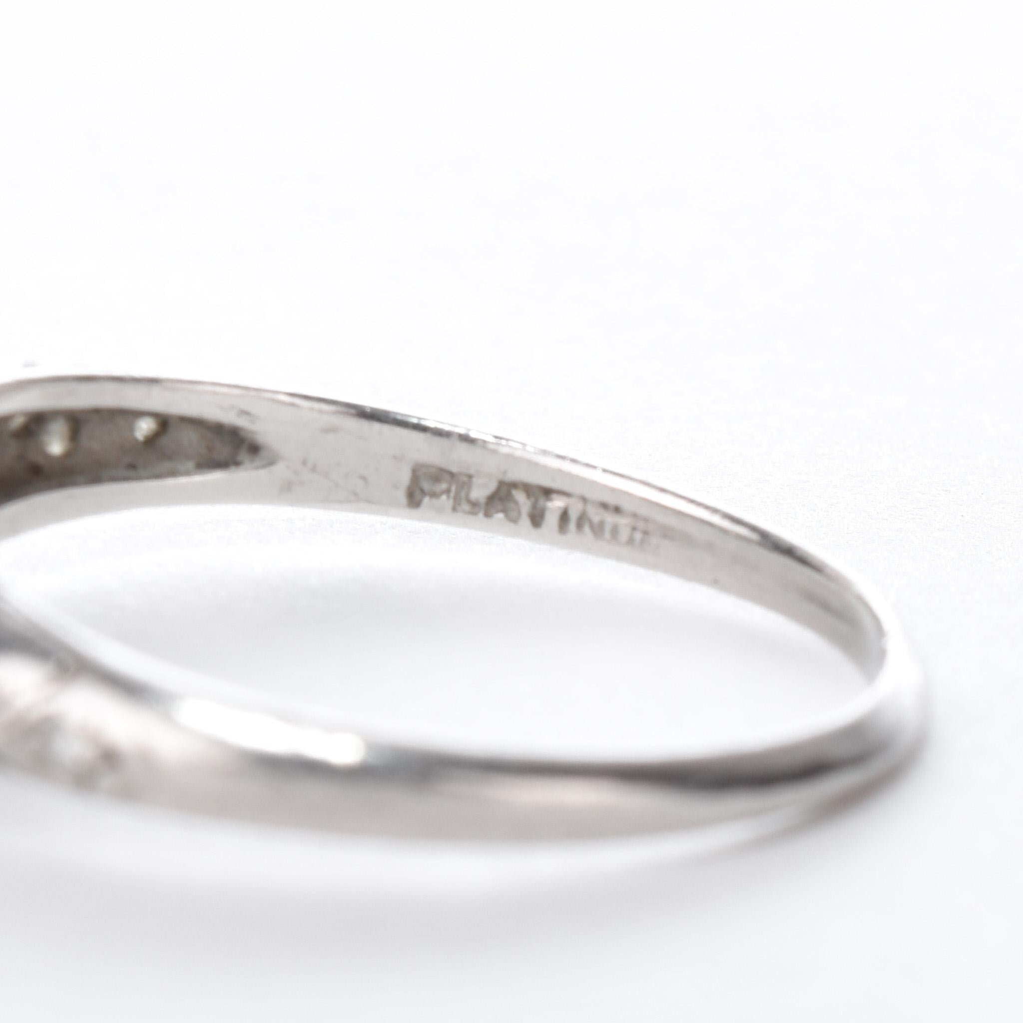 Platinum Natural .70 CT Round Cut Carved Engagement Ring