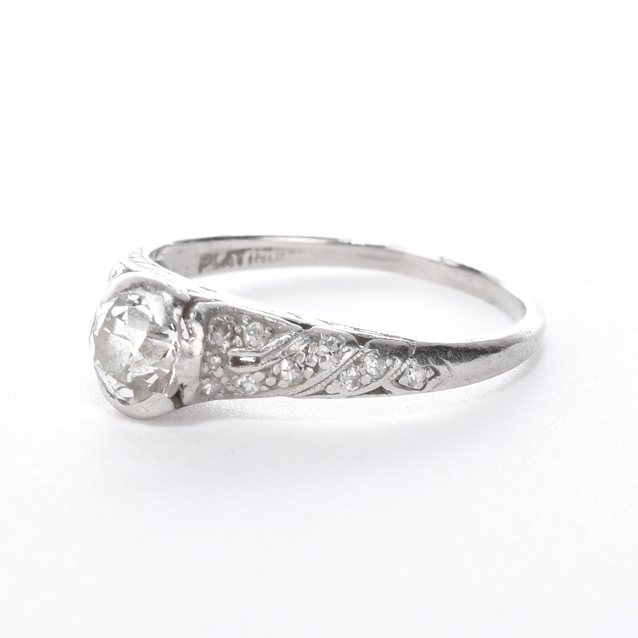 Platinum Natural .70 CT Round Cut Carved Engagement Ring