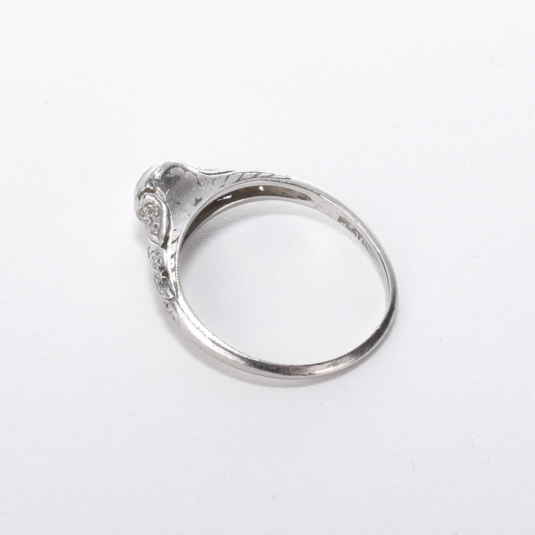 Platinum Natural .70 CT Round Cut Carved Engagement Ring