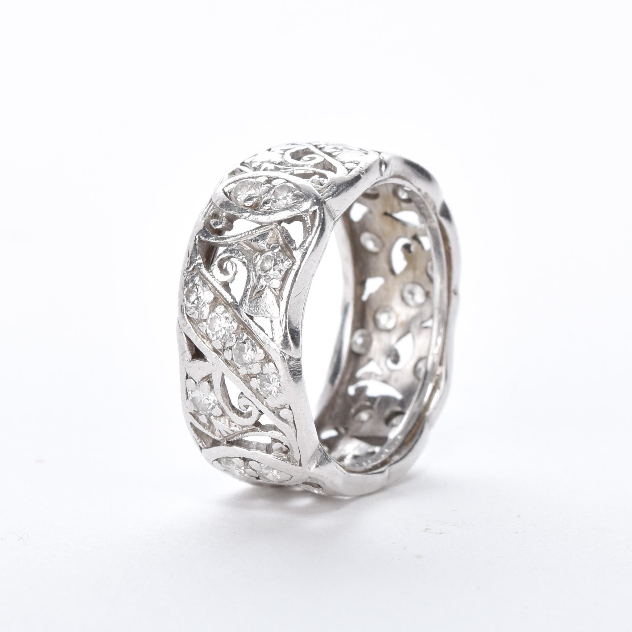 Platinum Thirty-Two Diamond Carved Eternity Band