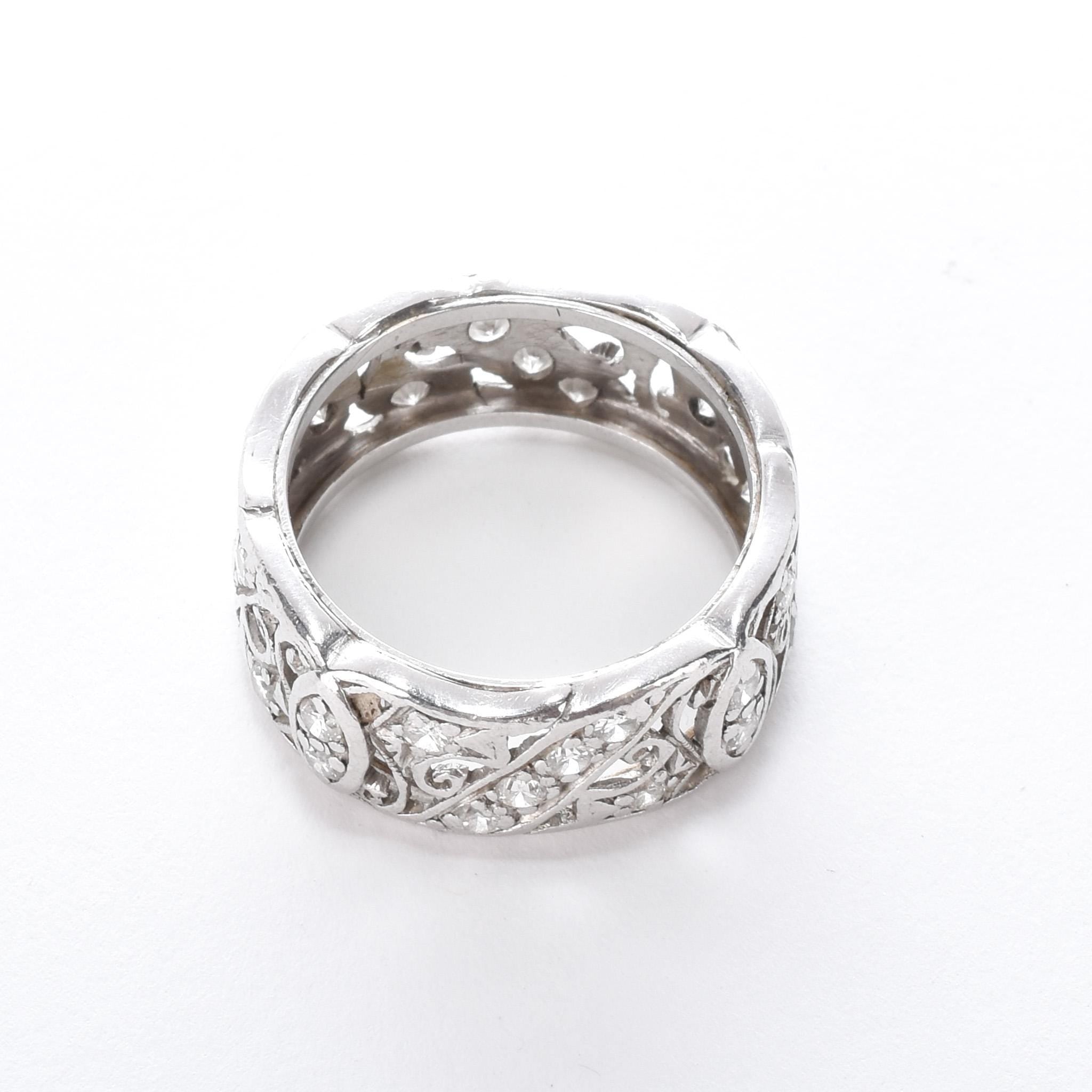 Platinum Thirty-Two Diamond Carved Eternity Band