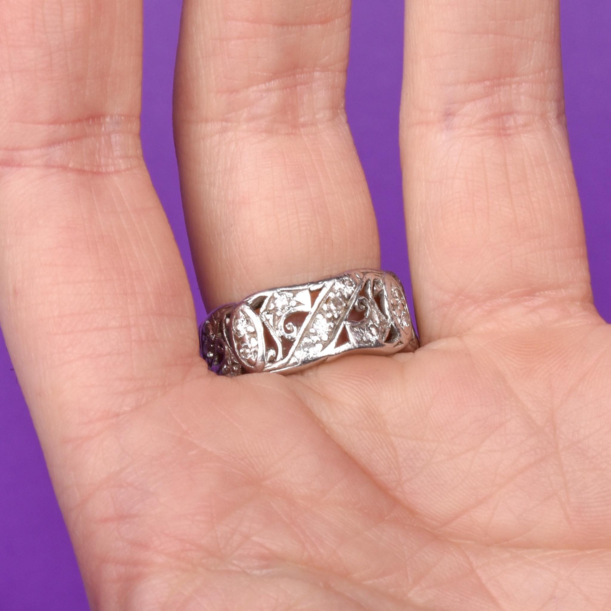 Platinum Thirty-Two Diamond Carved Eternity Band