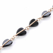 14K Gold and Heart-Shaped Onyx Link Bracelet
