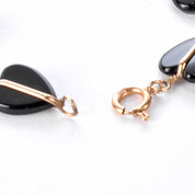 14K Gold and Heart-Shaped Onyx Link Bracelet