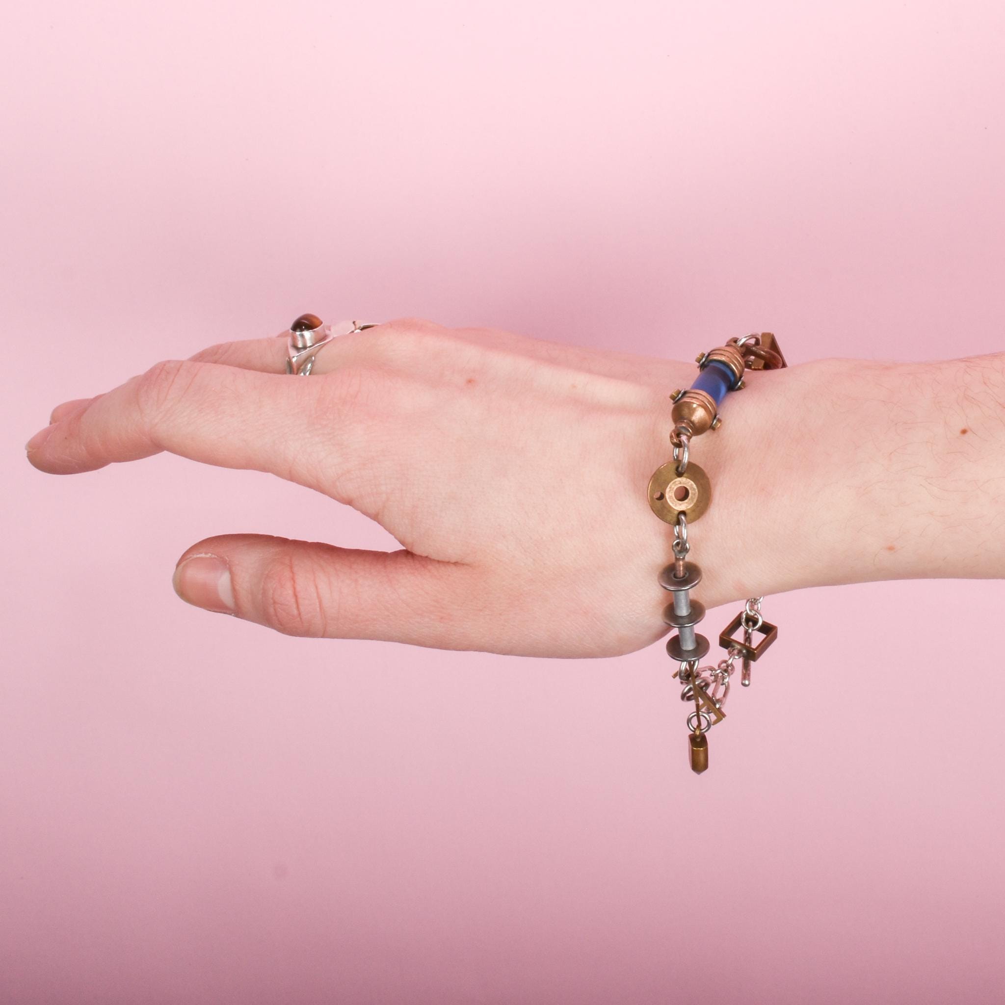 Collection of Signed Thomas Mann Techno-Romantic Mixed-Metal Jewelry