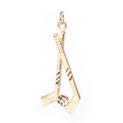 10K Gold Hockey Sticks and Puck Pendant