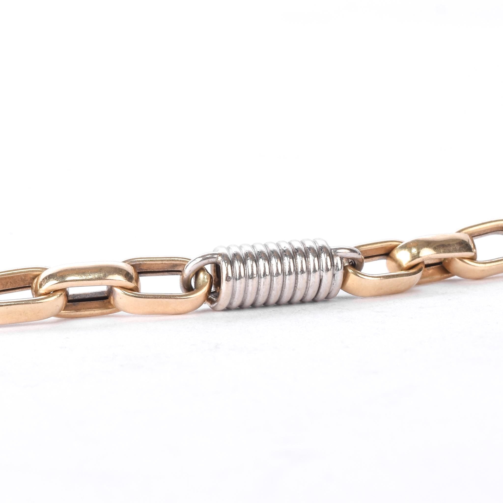 10K Two-Tone Gold Paperclip and Barrel Spring Link Bracelet