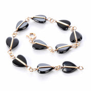 14K Gold and Heart-Shaped Onyx Link Bracelet