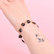 14K Gold and Heart-Shaped Onyx Link Bracelet