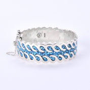 Taxco Sterling Silver And Turquoise Chip-Inlayed Wavy Hinged Bangle Bracelet