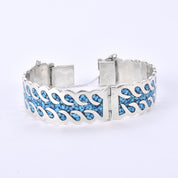 Taxco Sterling Silver And Turquoise Chip-Inlayed Wavy Hinged Bangle Bracelet