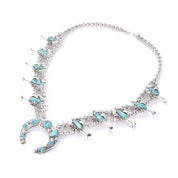 Hand-Signed Sterling Silver & Turquoise Horseshoe Squash Blossom