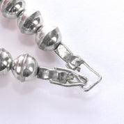 Hand-Signed Sterling Silver & Turquoise Horseshoe Squash Blossom