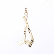 10K Gold Hockey Sticks and Puck Pendant