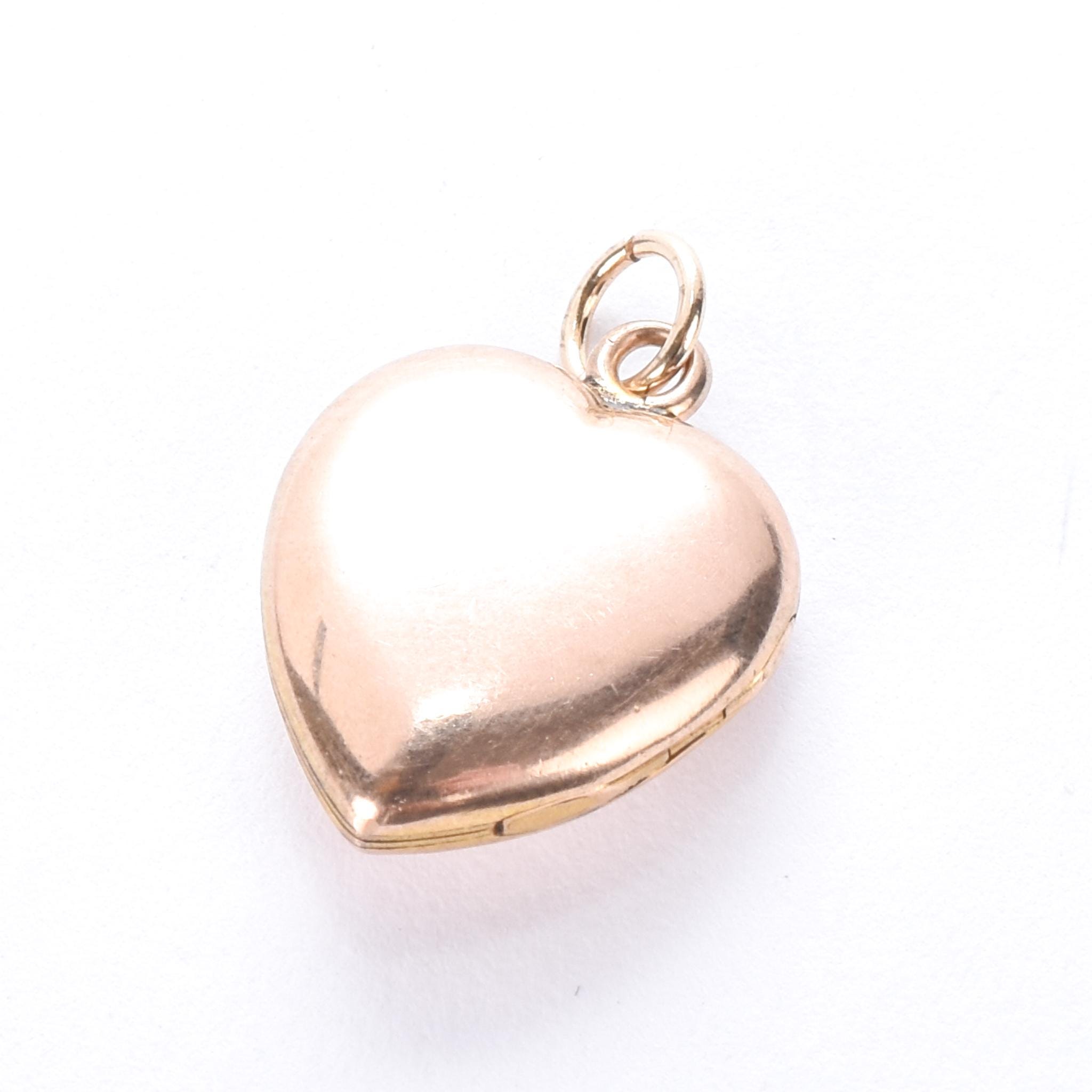 Antique 10K Gold Heart-Shaped Locket with Star-Set Seed Pearl