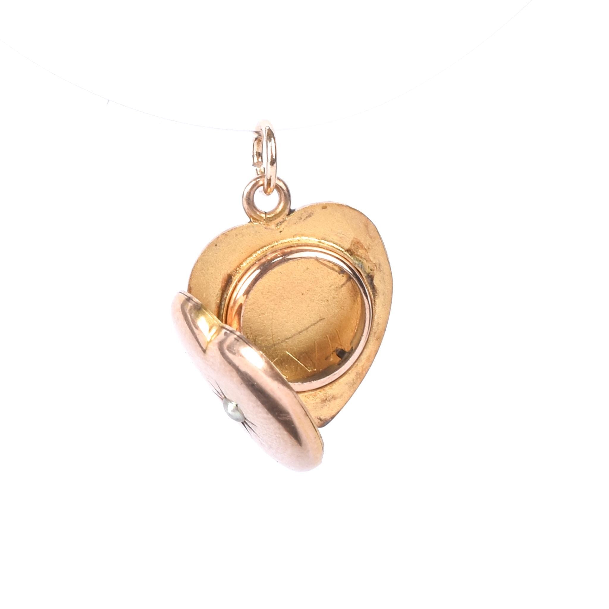 Antique 10K Gold Heart-Shaped Locket with Star-Set Seed Pearl