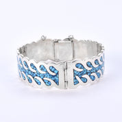 Taxco Sterling Silver And Turquoise Chip-Inlayed Wavy Hinged Bangle Bracelet