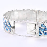 Taxco Sterling Silver And Turquoise Chip-Inlayed Wavy Hinged Bangle Bracelet