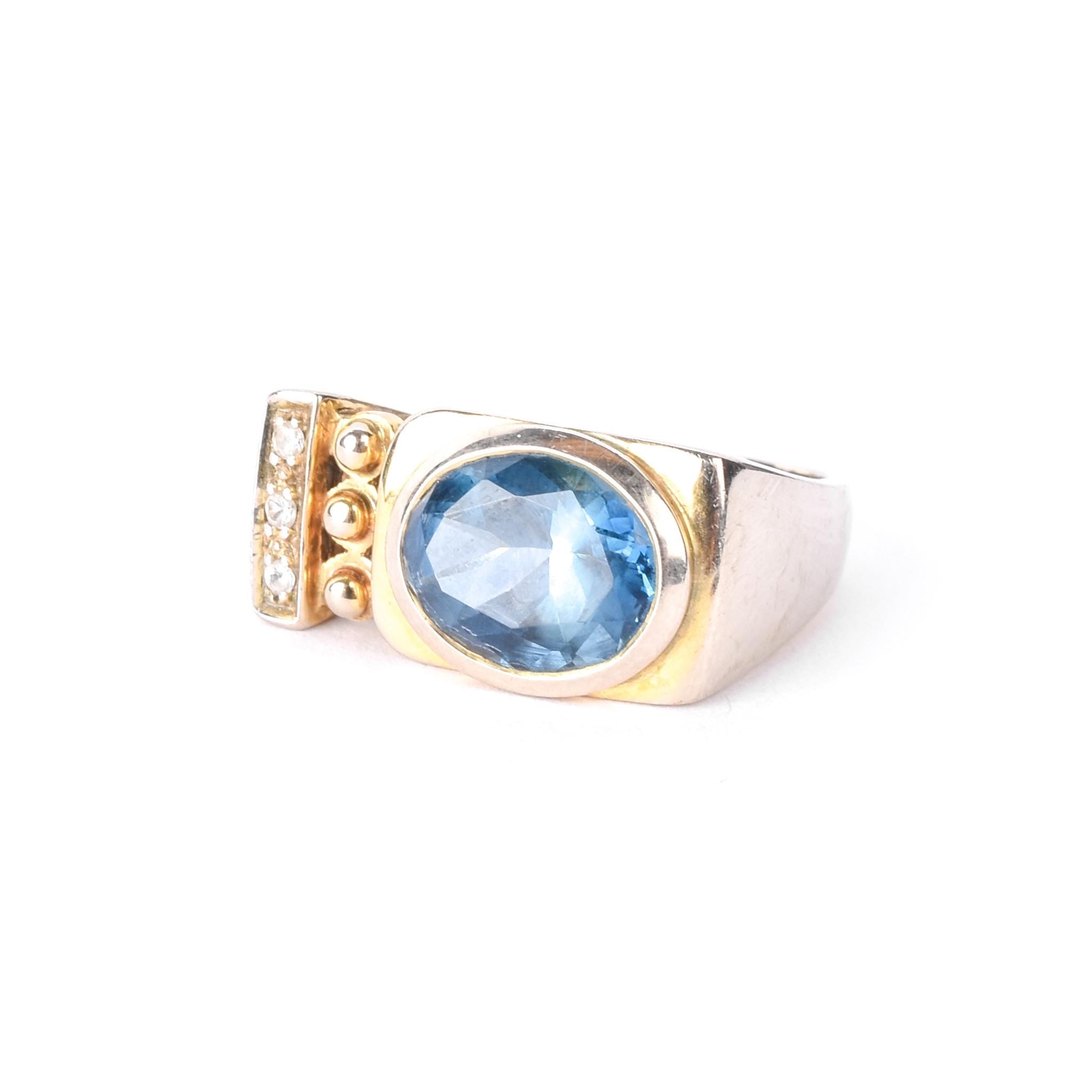 10K Gold Modernist Blue and Clear Topaz Ring