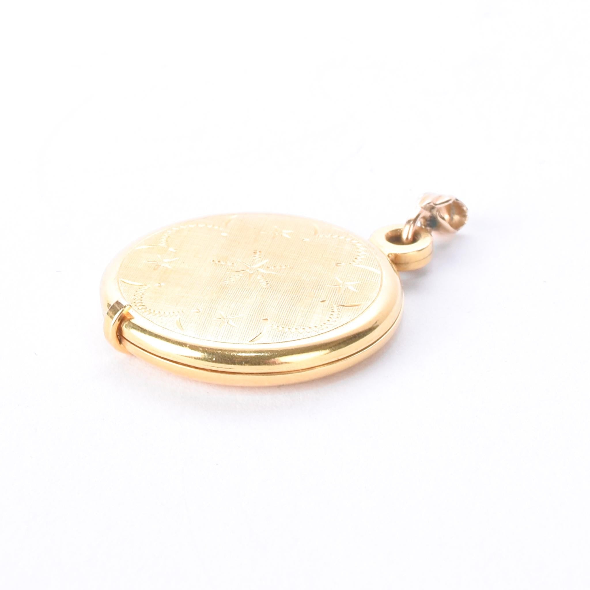 Vintage 14K Gold Star Etched Slide Locket