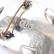 Sterling Silver Mexican Diety Hugging an Onyx Pendant
