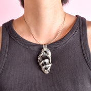 Sterling Silver Mexican Diety Hugging an Onyx Pendant