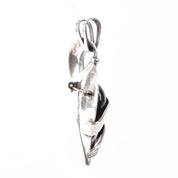 Sterling Silver Mexican Diety Hugging an Onyx Pendant