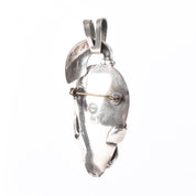 Sterling Silver Mexican Diety Hugging an Onyx Pendant