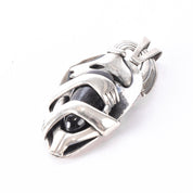 Sterling Silver Mexican Diety Hugging an Onyx Pendant