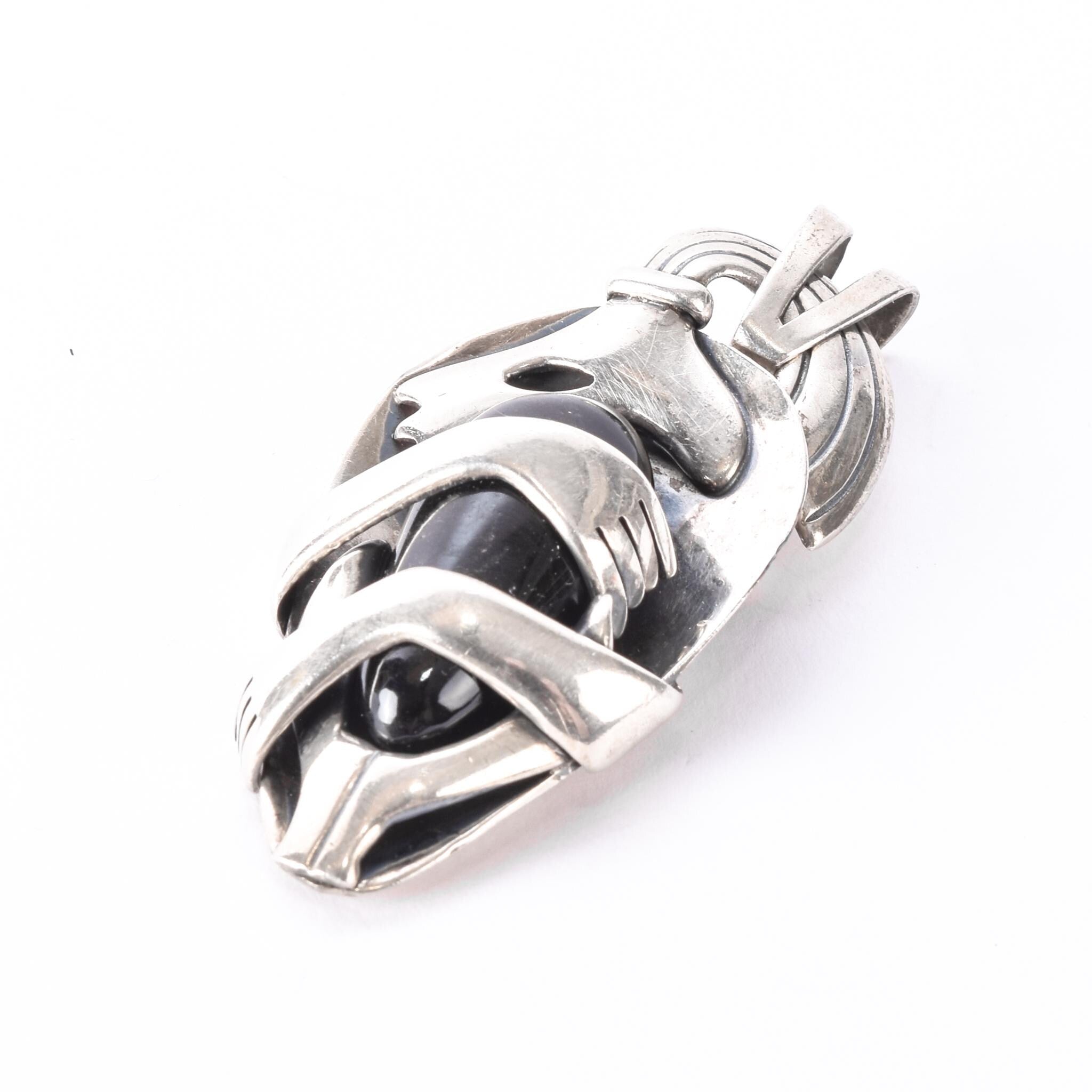 Sterling Silver Mexican Diety Hugging an Onyx Pendant