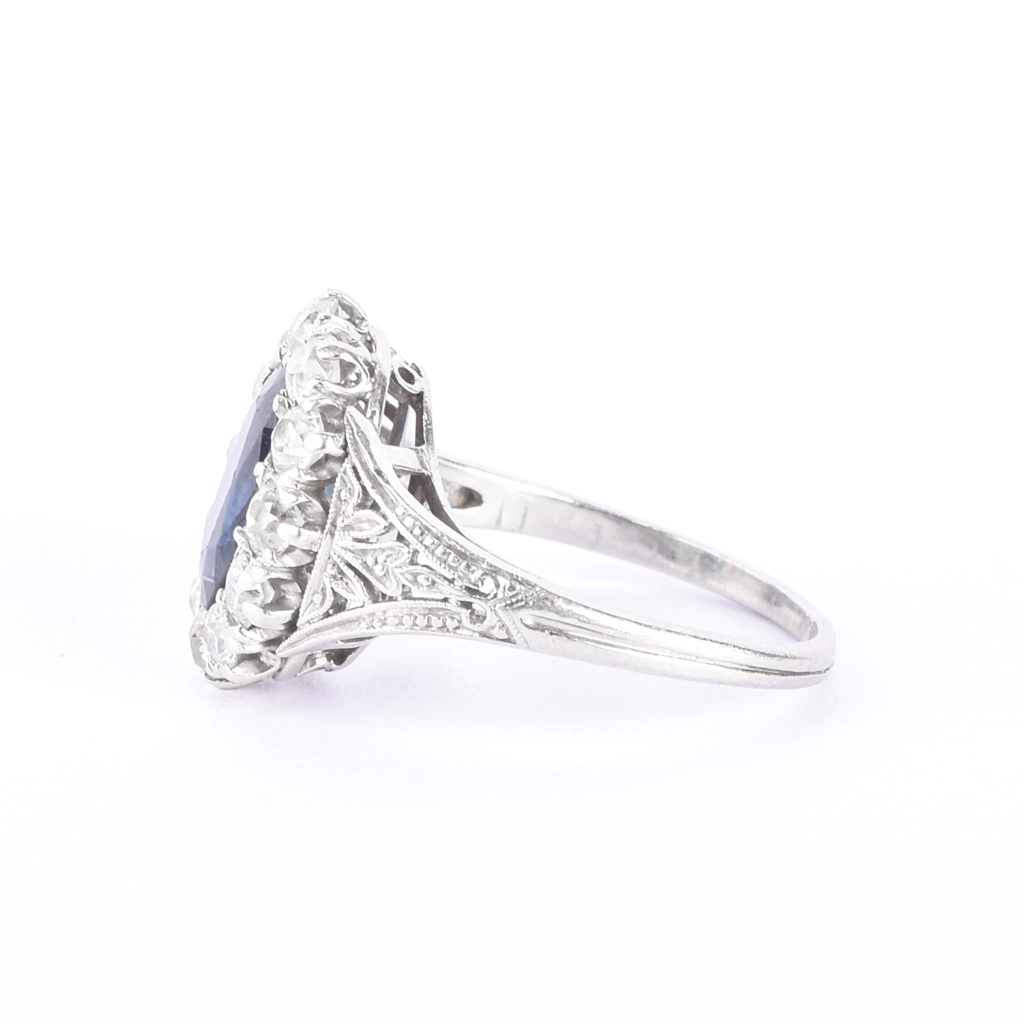 Platinum 2.14 CT Natural Sapphire & Diamonds Halo Ring