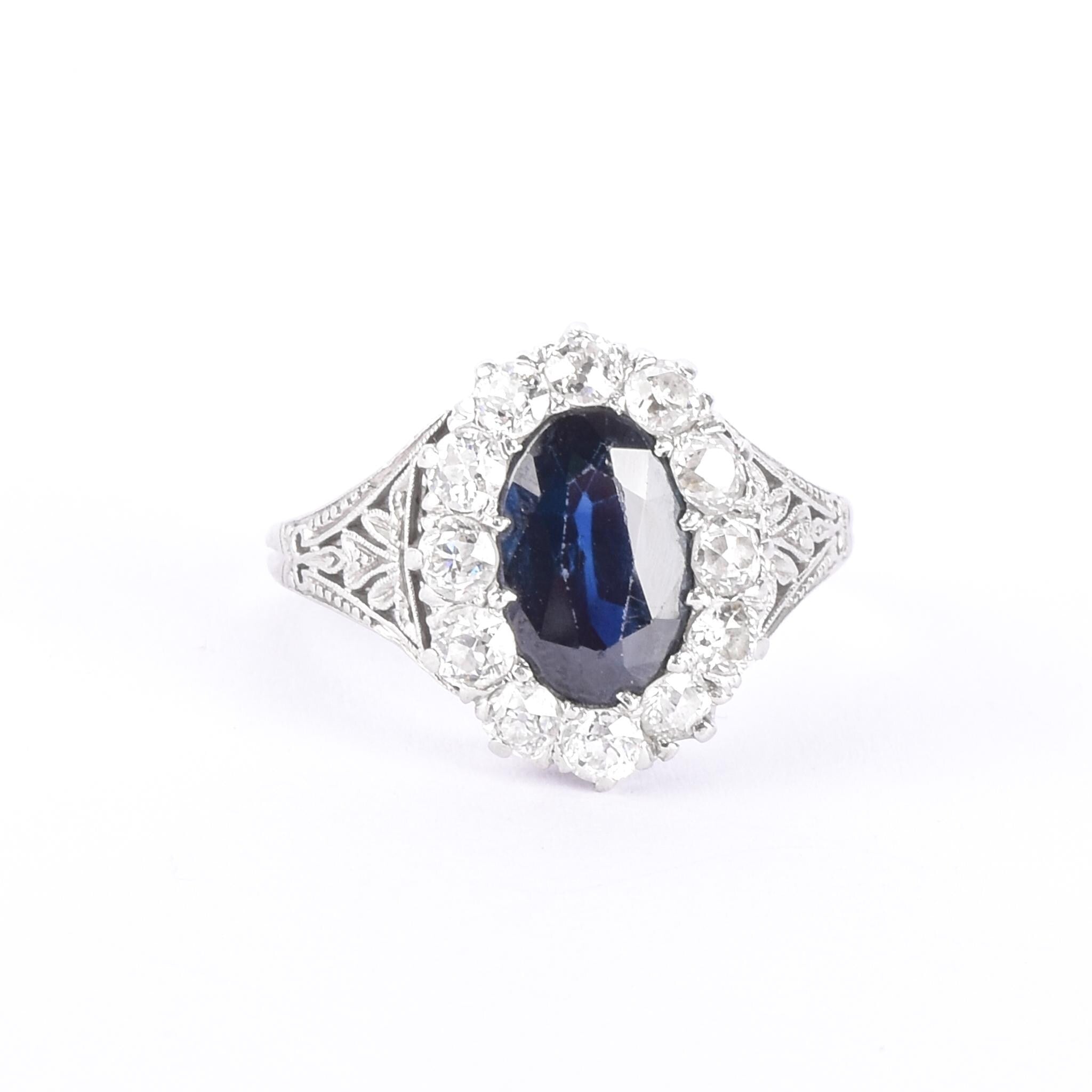 Platinum 2.14 CT Natural Sapphire & Diamonds Halo Ring