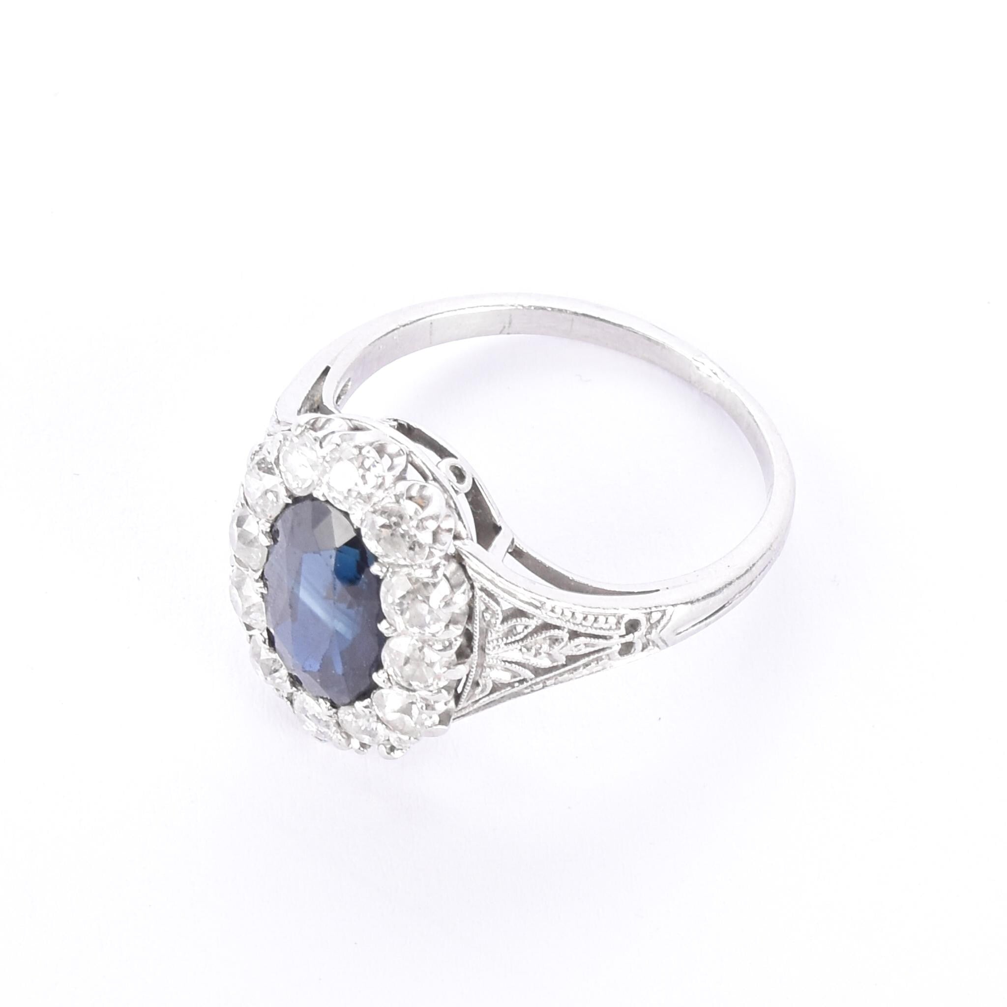 Platinum 2.14 CT Natural Sapphire & Diamonds Halo Ring