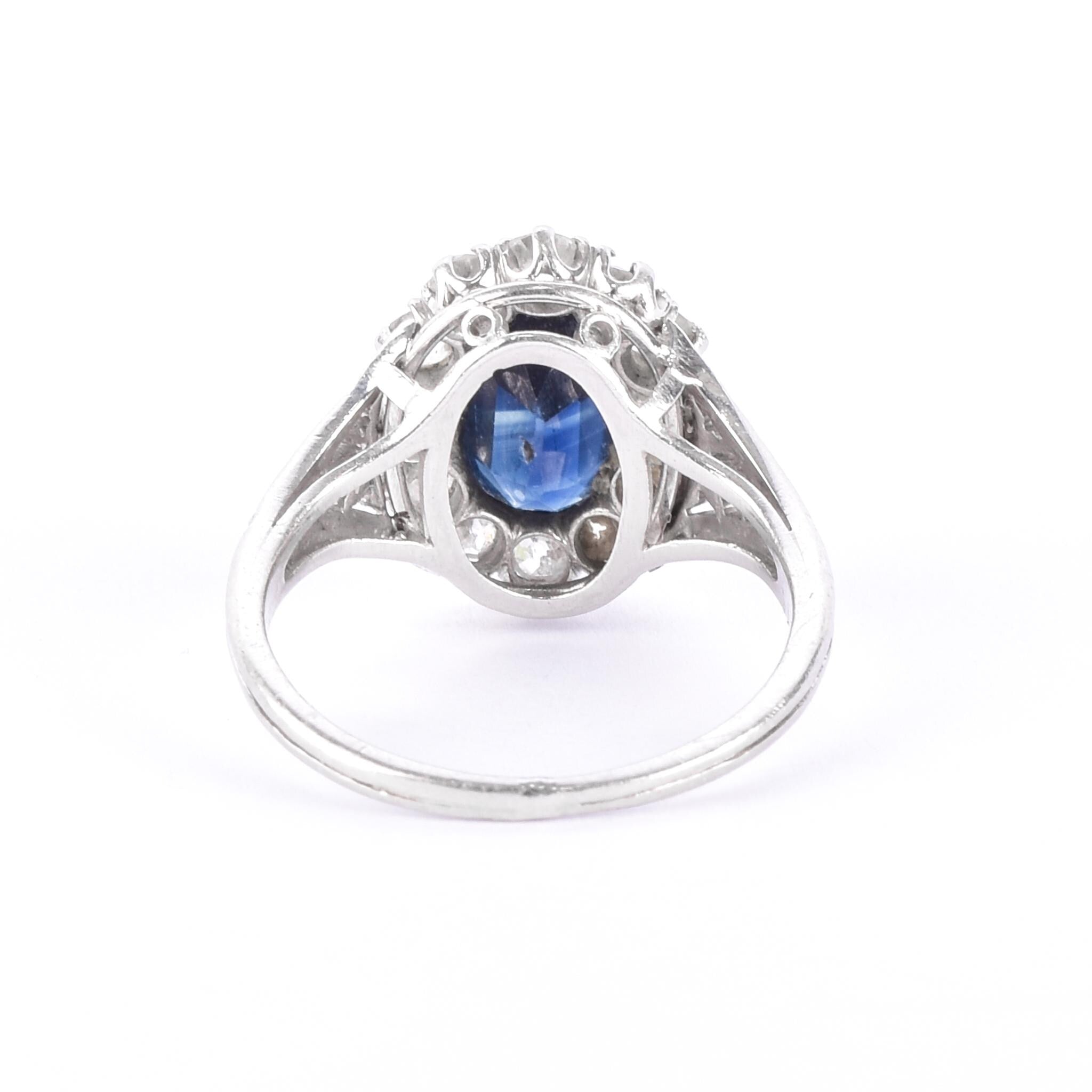 Platinum 2.14 CT Natural Sapphire & Diamonds Halo Ring