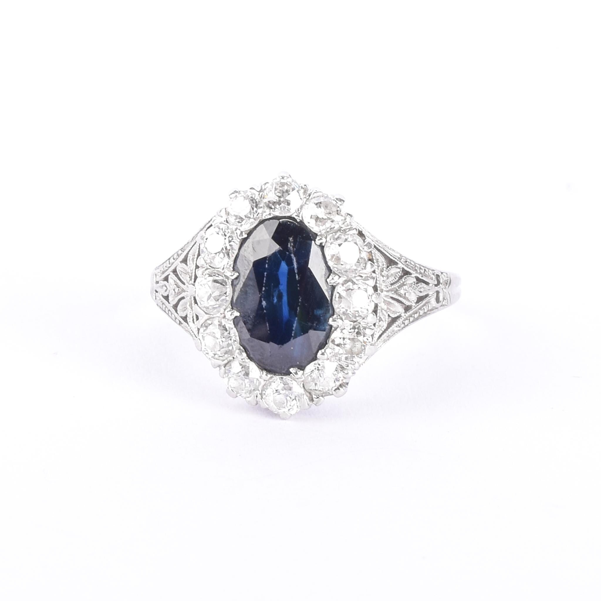 Platinum 2.14 CT Natural Sapphire & Diamonds Halo Ring