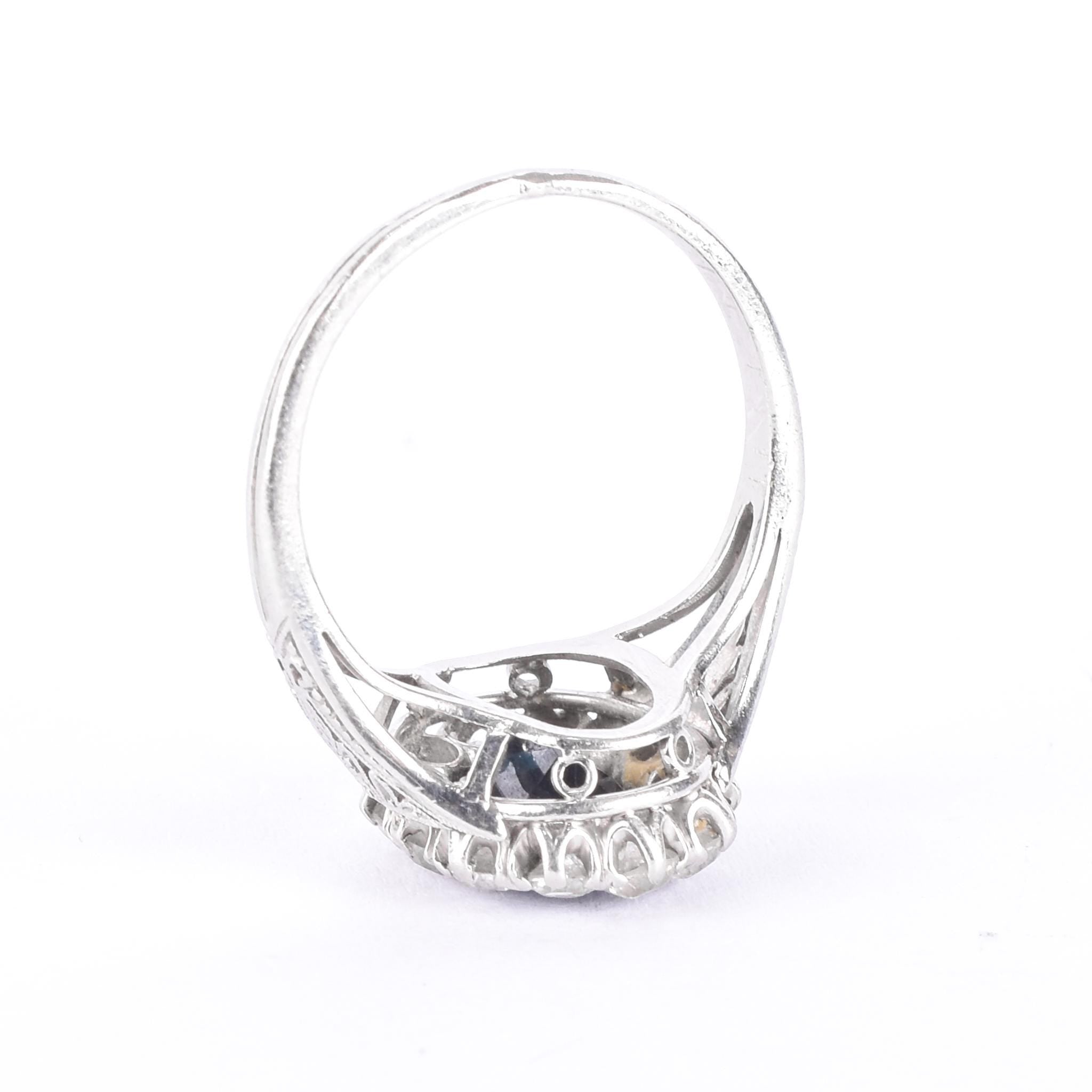 Platinum 2.14 CT Natural Sapphire & Diamonds Halo Ring