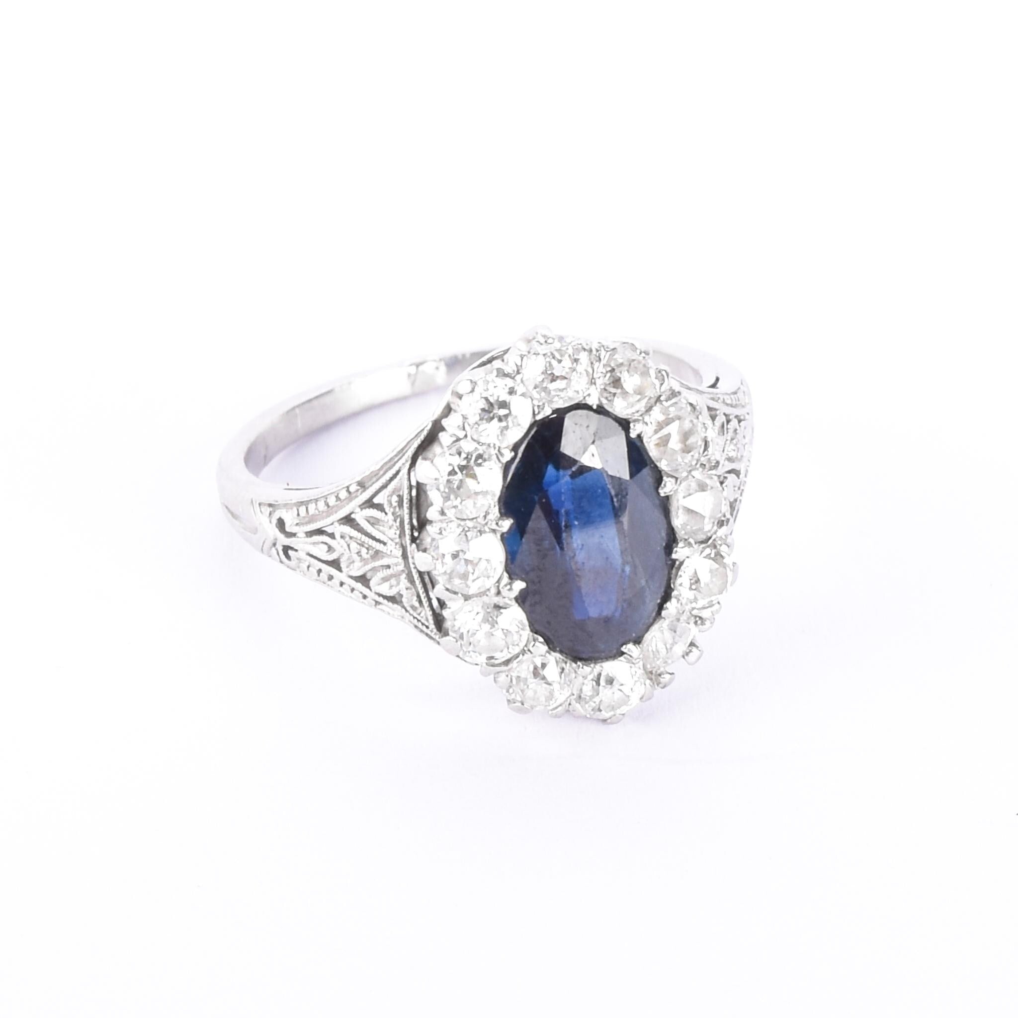 Platinum 2.14 CT Natural Sapphire & Diamonds Halo Ring