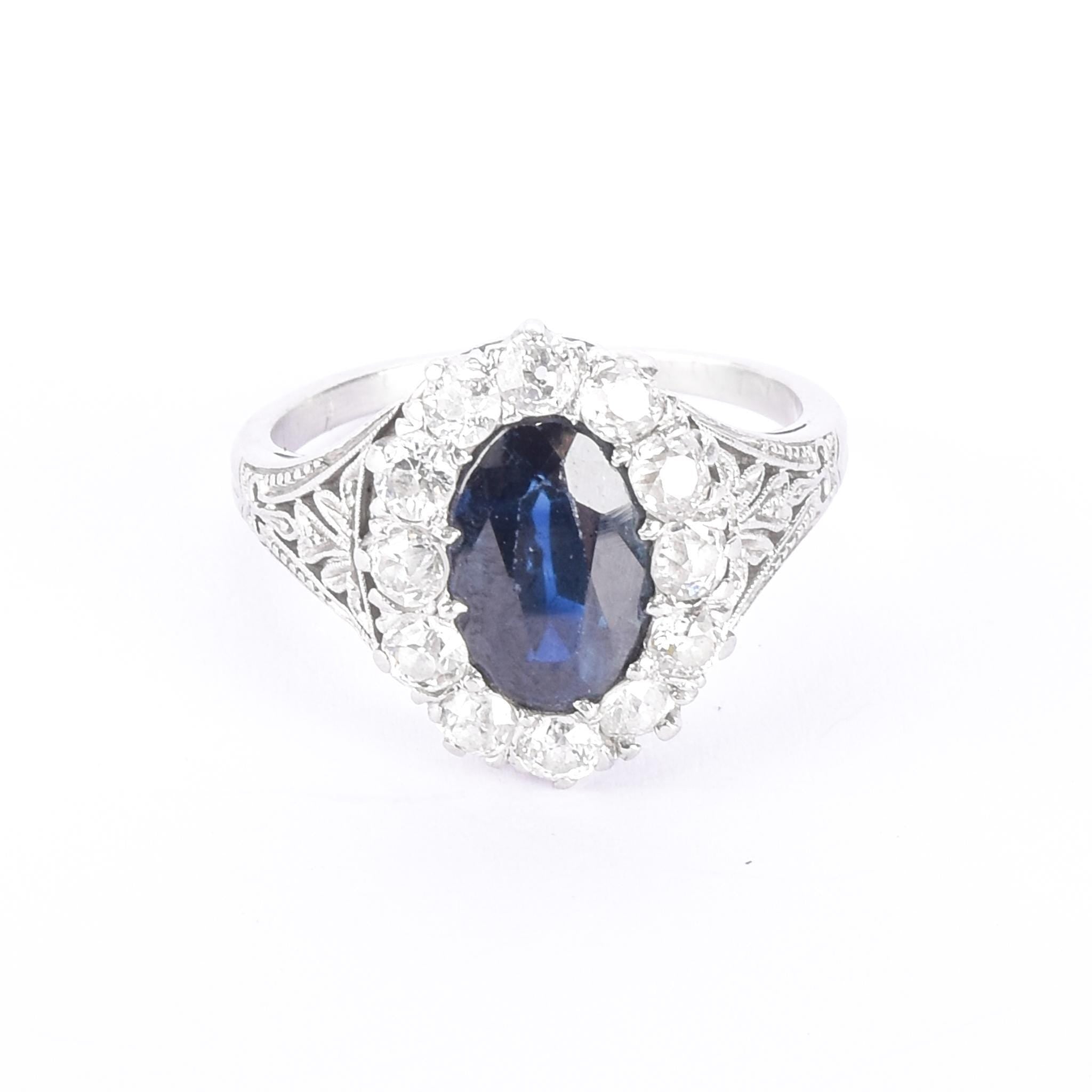 Platinum 2.14 CT Natural Sapphire & Diamonds Halo Ring