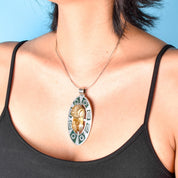 Sterling Silver Taxco Carved Rudilated Quartz Mayan Mask & Malachite Chip Inlay Pendant